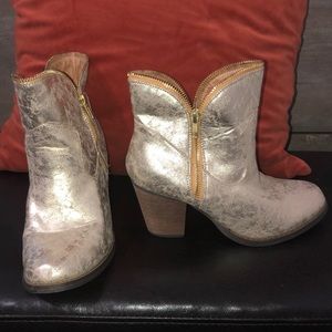 Gold zippered boots